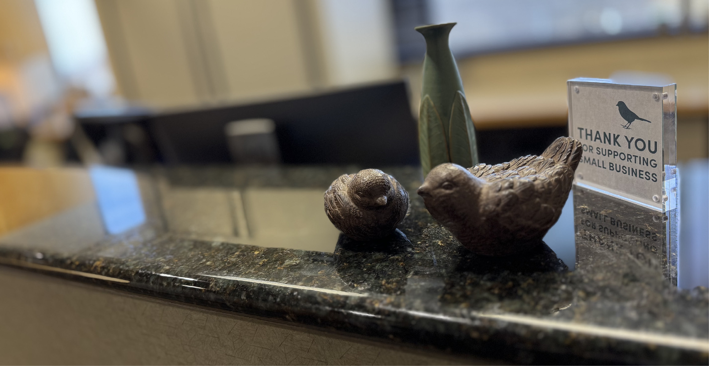 A welcome display at the Allen and Holm front desk